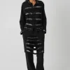 ținută chic avangardistă cu jachetă și pantaloni neagră damă